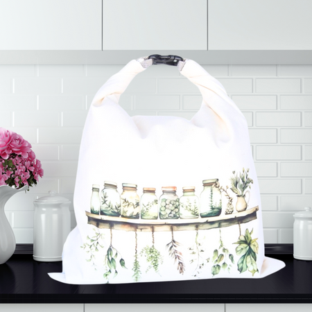 Reusable bread bag with apothecary print—eco-friendly option for storing fresh homemade loaves.