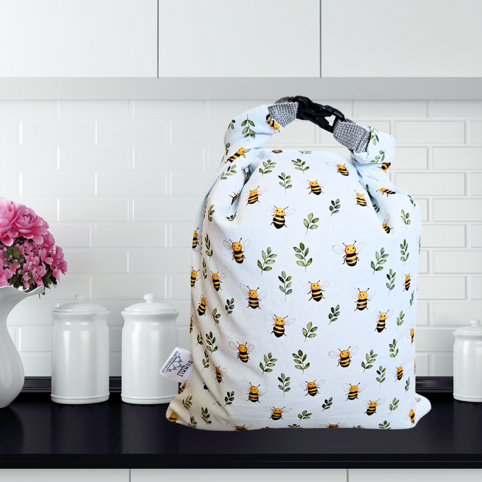 Eco-friendly reusable bread bag with bees and flowers—ideal for plastic-free kitchen and sourdough storage. Machine washable.