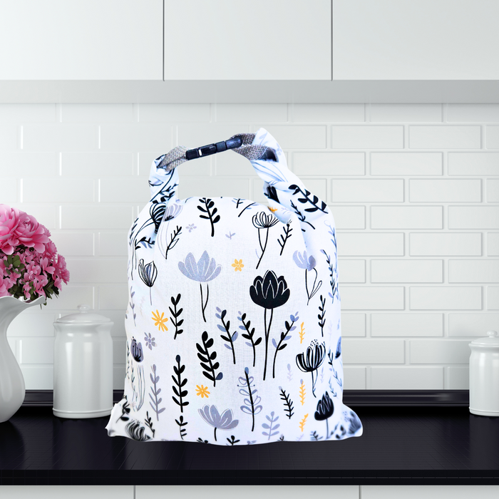 floral print eco bread bag—reusable and breathable for storing sourdough bread or buns.