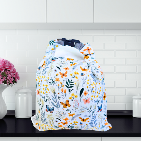 Reusable bread bag with butterfly garden print—eco-friendly storage for sourdough and baked goods.