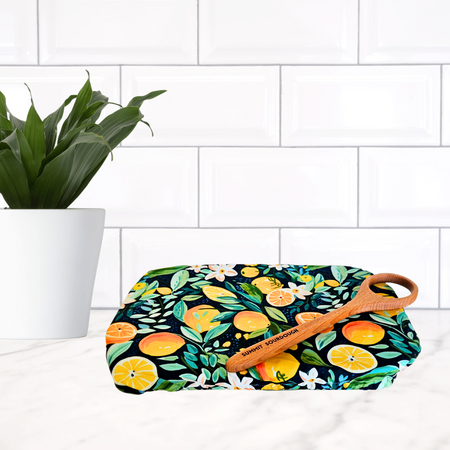 Sustainable reusable casserole cover in mixed clementine citrus print—plastic wrap alternative made in Canada.