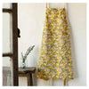 Golden yellow Clematis baking apron with pockets and adjustable straps for bread baking and sourdough bread.