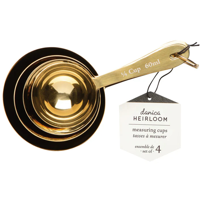 Top view of the Danica Heirloom Gold Measuring Cups Set of 4 showing the nested stainless steel design.