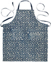 Close-up of the Danica Heirloom Vinebloom hand block print cotton fabric featuring indigo and white botanical detailing.