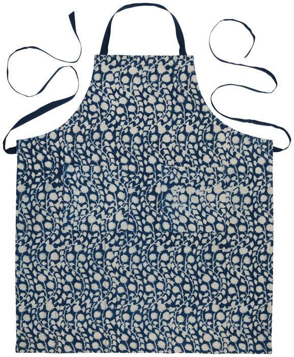 Close-up of the Danica Heirloom Vinebloom hand block print cotton fabric featuring indigo and white botanical detailing.