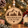 Bring a little rustic charm to your Christmas tree with our Sourdough Country Wooden Christmas Ornament. Featuring a beautifully engraved mountain landscape, towering evergreen trees, and a sweet heart detail, this ornament celebrates the simple pleasures of country living and the art of sourdough baking.