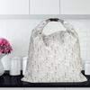Neutral Bread bag with floral design for sourdough bread storage.