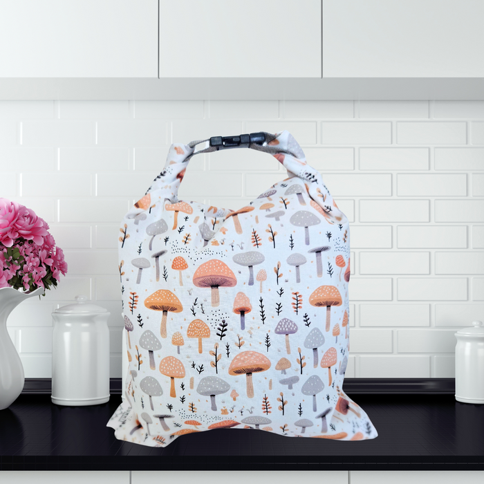 Whimsical mushroom print reusable bread bag—eco-friendly storage for homemade sourdough loaves.
