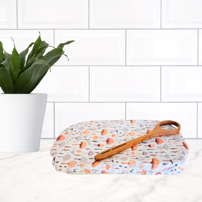 Woodland mushroom print reusable casserole cover—earthy and magical, made in Canada for zero-waste kitchens.