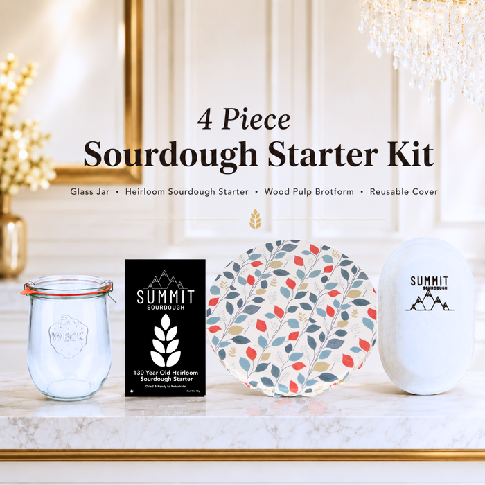Nordic Canopy 4 piece sourdough starter kit by Summit Sourdough featuring a glass jar, heirloom sourdough starter, reusable oval brotform cover, and oval wood pulp banneton. Made in Canada