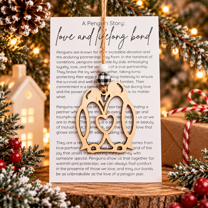 Wooden penguin couple Christmas ornament with Love and Lifelong Bond story card, a meaningful gift celebrating lasting love, loyalty and partnership.