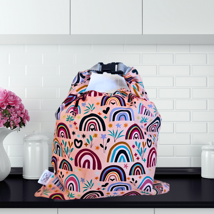 Colorful rainbow print reusable bread bag—sustainable storage for sourdough, buns, or bagels.