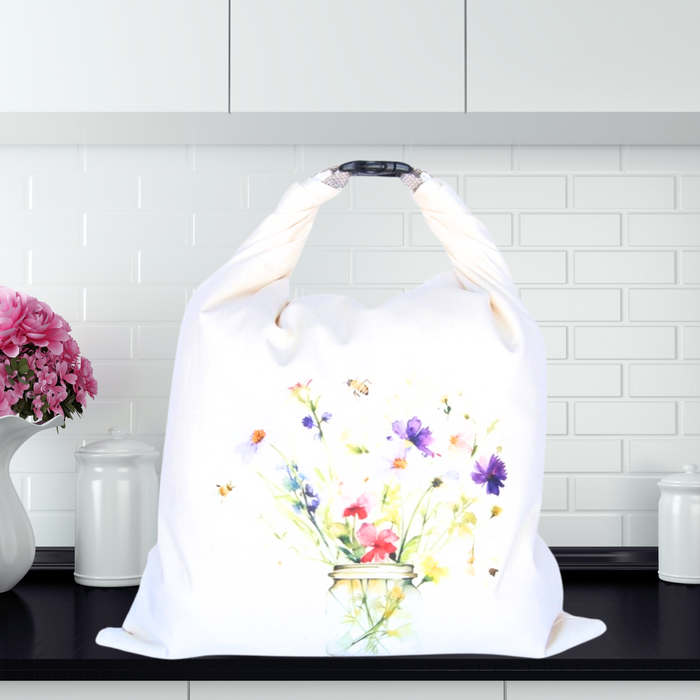 Reusable sourdough bread storage bag with bees and floral print—sustainable and stylish. Made in Canada.