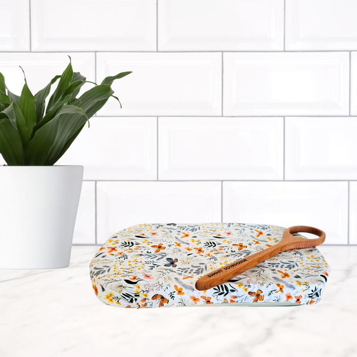 Reusable casserole dish cover in butterfly floral print—eco-friendly, washable, and made in Canada.