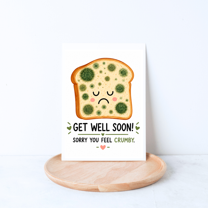 Sorry You Feel Crumby sourdough get well card featuring a cute sick bread character with a funny bread pun.  Perfect for bakers and more.