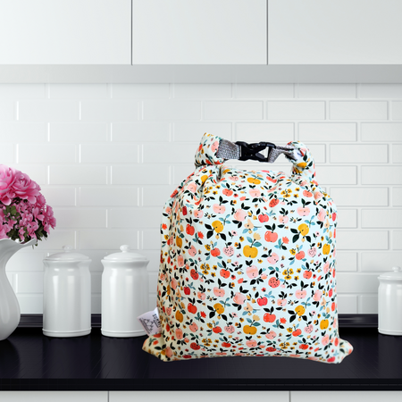 Sourdough bread bag in apple print—reusable, washable, and great for plastic-free bread storage.