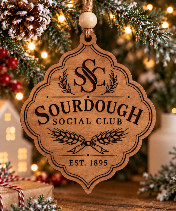 Stained wood Sourdough  Bread Social Club ornament with vintage wheat details and EST 1895 engraving