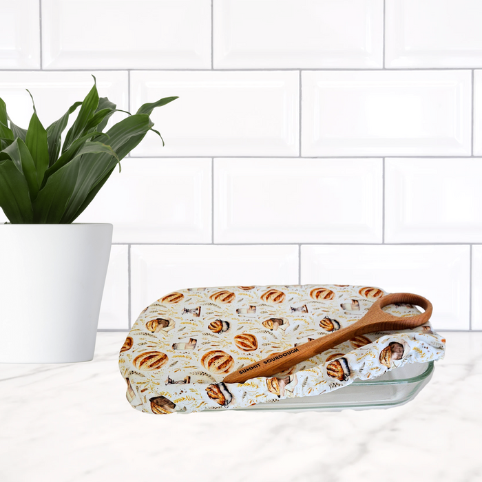 Sourdough bread print casserole dish cover—eco-conscious, washable, and proudly made in Canada.