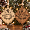 Sourdough Social Club wooden Christmas ornament shown in natural and stained wood finishes