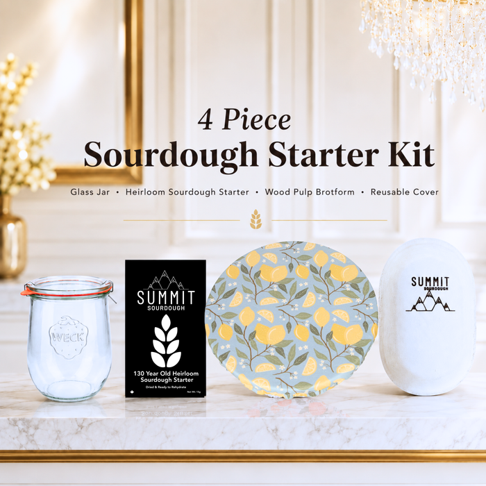 Limoncello 4 piece sourdough starter kit by Summit Sourdough featuring a glass jar, heirloom sourdough starter, reusable oval brotform cover, and oval  batard wood pulp banneton brotform